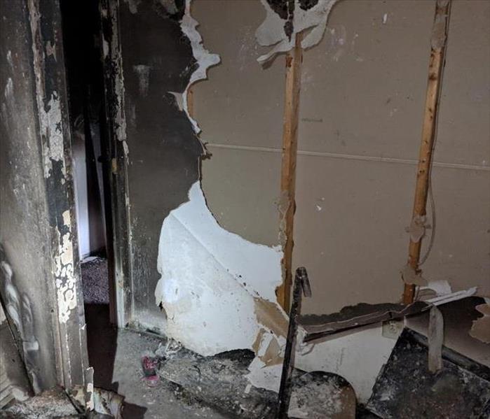 sheetrock and framing damage from fire